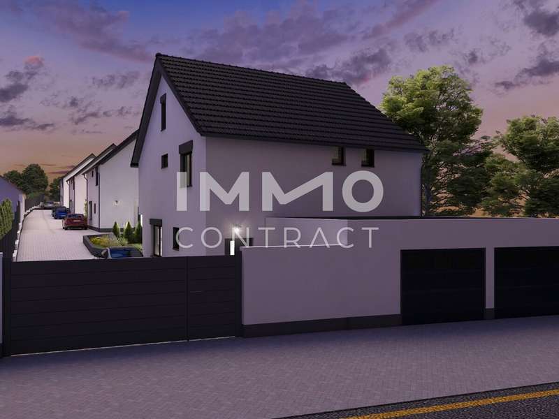 Einfamilienhaus Edelstal: Straßenansicht Haus 1 Dämmerung Straßenansicht Haus 1 Dämmerung