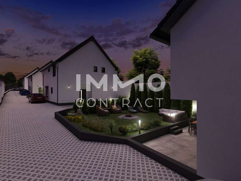 Einfamilienhaus Edelstal: Gartenansicht Haus 1 Dämmerung Gartenansicht Haus 1 Dämmerung