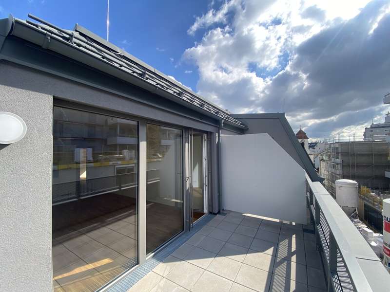 Dachterrasse mit Kirchturmblick