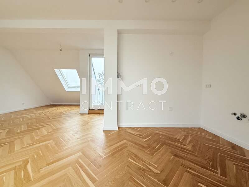 Dachgeschosswohnung Wien: Wohnküche mit direktem Zugang zur Terrasse Wohnküche mit direktem Zugang zur Terrasse