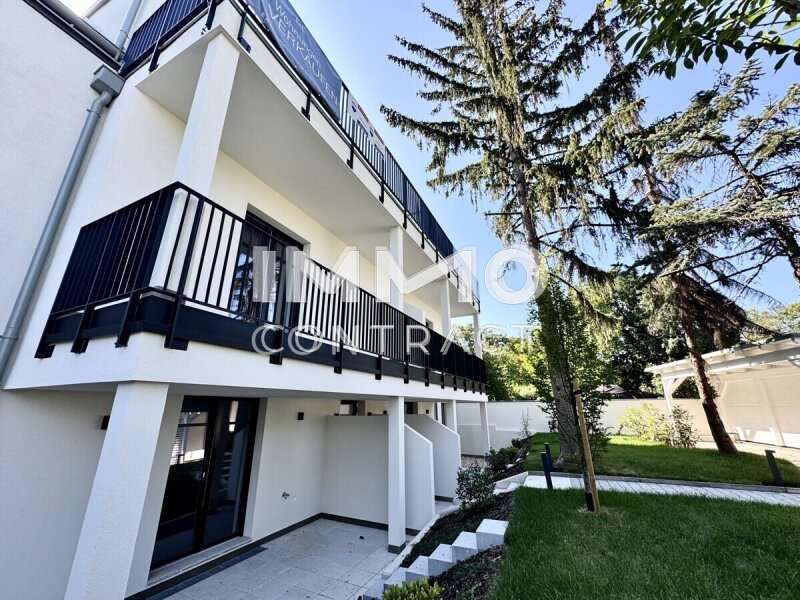 Dachgeschosswohnung Wien: Gartenansicht Gartenansicht