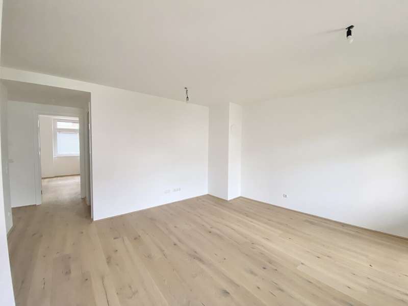Eigentumswohnung Wien: Wohnesszimmer mit Blick Richtung Schlafzimmer Wohnesszimmer mit Blick Richtung Schlafzimmer