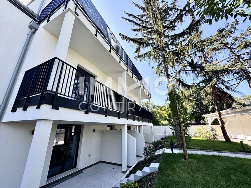 Dachgeschosswohnung Wien: Gartenansicht Gartenansicht