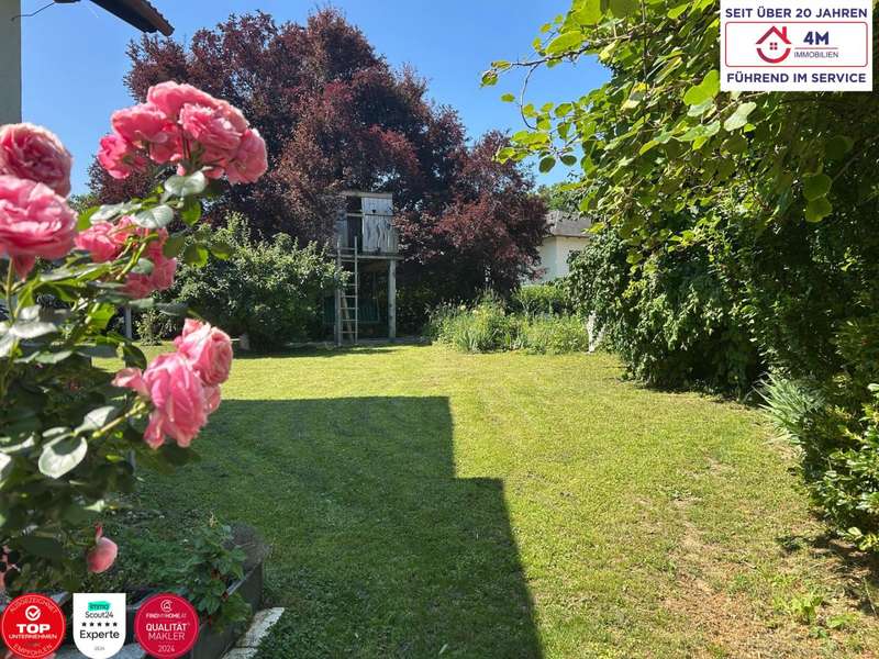 Einfamilienhaus Wilfersdorf: Garten mit Baumhaus Garten mit Baumhaus