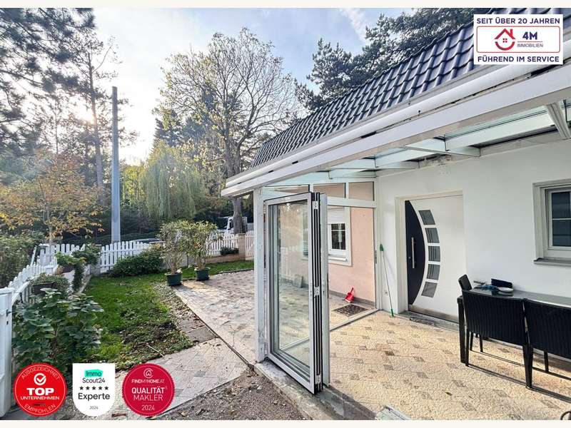 Einfamilienhaus Wien: Überdachte Terrasse Überdachte Terrasse