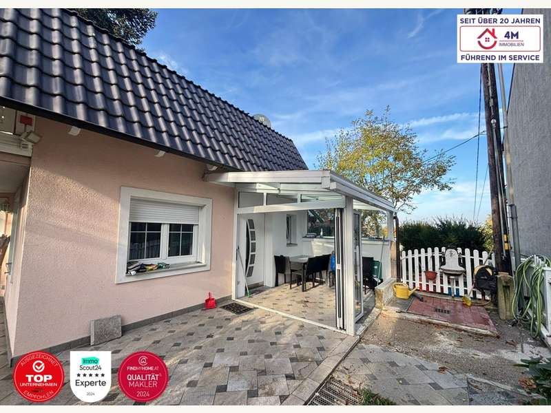 Einfamilienhaus Wien: Überdachte Terrasse Überdachte Terrasse