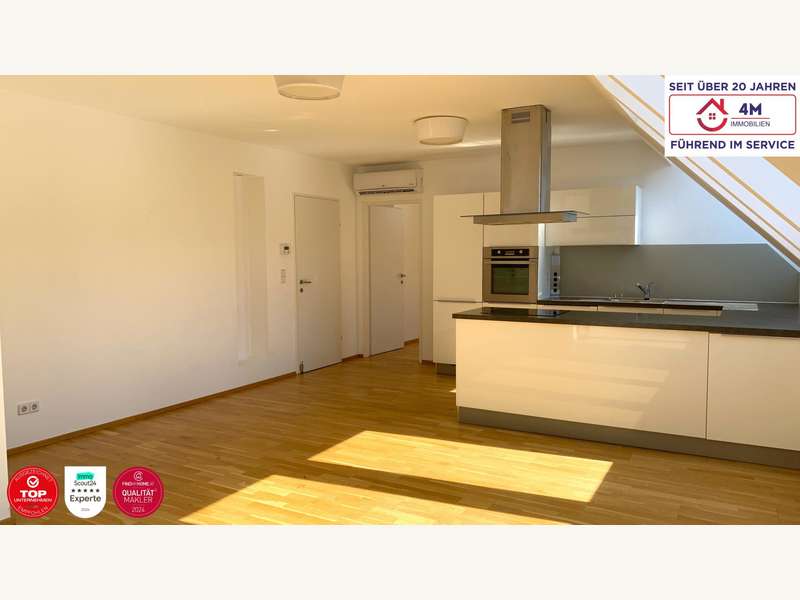 Dachgeschosswohnung Wien: Wohnbereich und Kücheninsel Wohnbereich und Kücheninsel